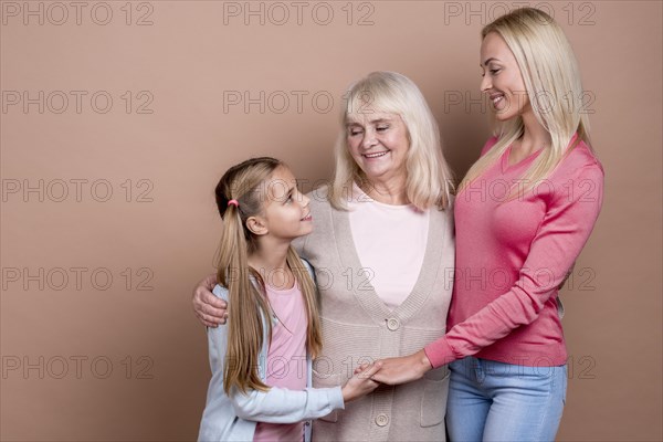 Mother daughter holding hands