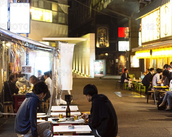 People enjoying traditional japanese food