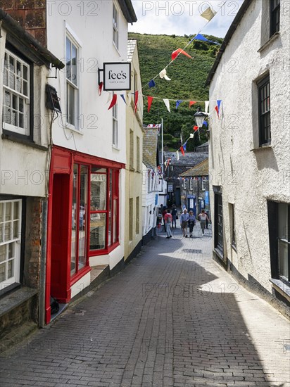 Pedestrians in a narrow alley