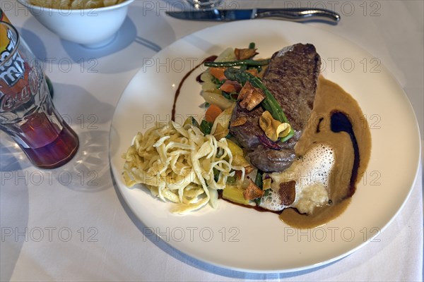 Steak with vegetables and spaetzle