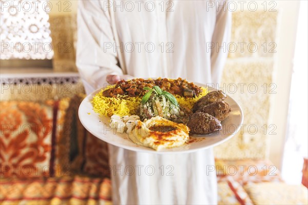 Man showing dish arab food