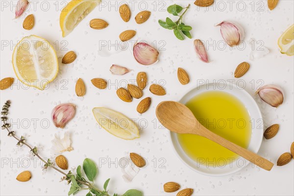 Olive oil with cooking ingredients top view