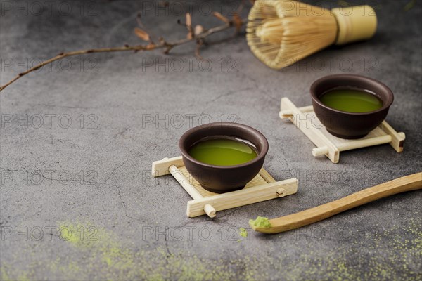 Close up matcha tea cups with copy space