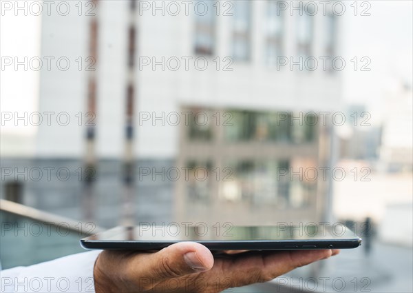 Business man holding tablet hand