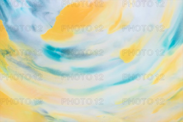Yellow turquoise ink stain design texture backdrop