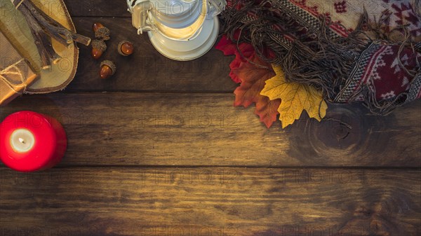 Cozy autumn composition with lantern leaves