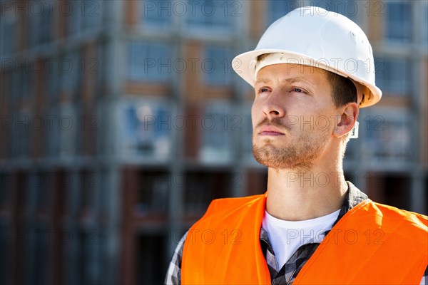 Portrait construction engineer looking away