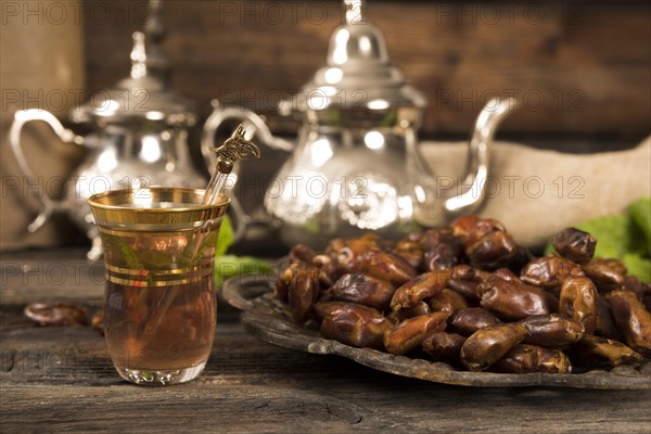 Dates fruit plate with tea glass