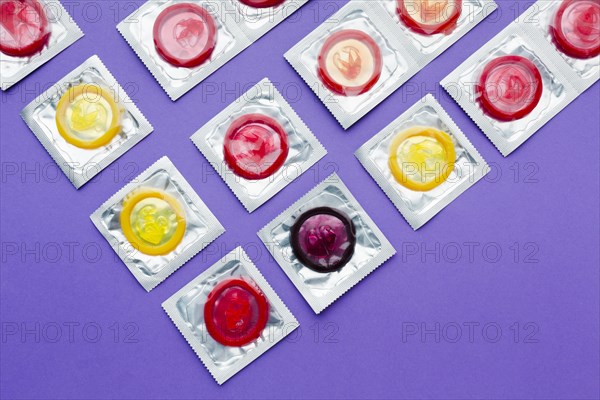 Flat lay arrangement contraception concept purple background