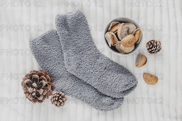 Top view fluffy socks with pine cones