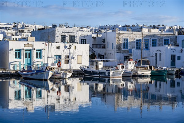 Harbour with fishing boats and reflection