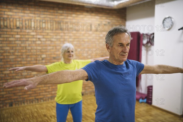 Older couple training gym