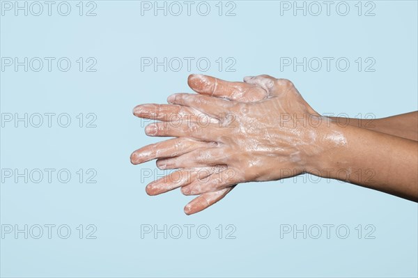 Side view hands washing