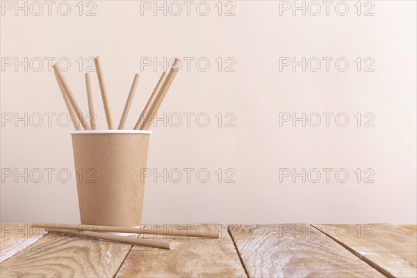 Paper cup holding paper straws