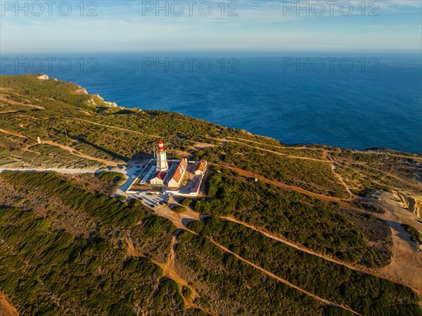 Aerial drone view of lighthouse on Cabo Espichel cape Espichel on Atlantic ocean