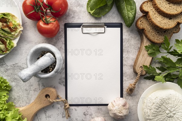 Top view empty menu with tomatoes bread