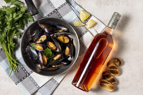 Delicious mussel with bottle wine