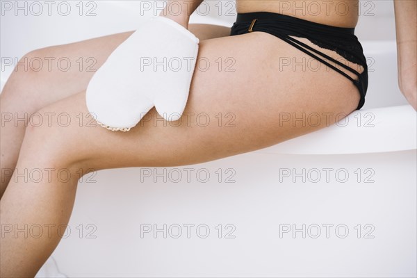 Woman taking relaxing bath spa