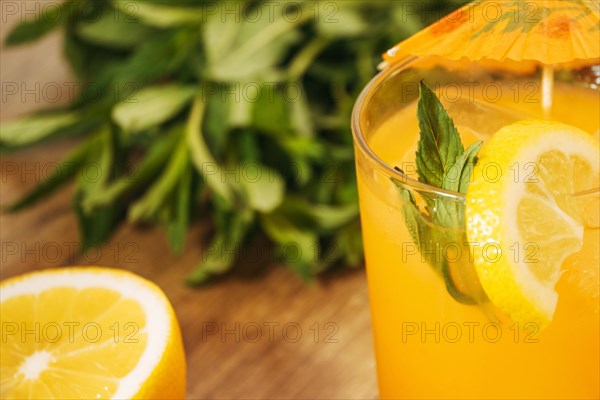 Orange drink with lemon slice