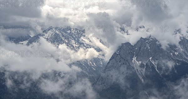 Cloudy rocky peaks of the Wetterstein mountains