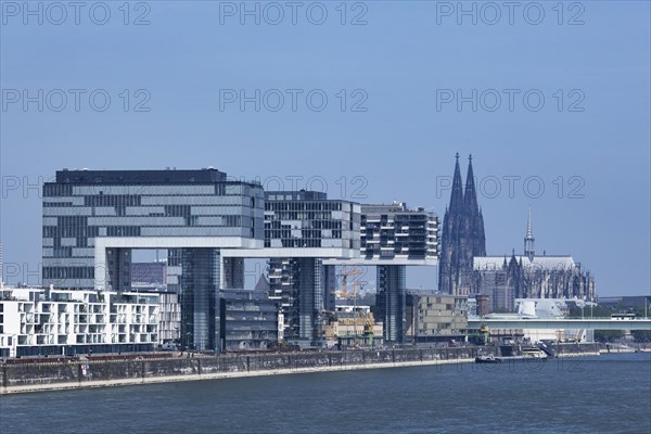 City view of the Rheinauhafen in Cologne with the 3 crane houses