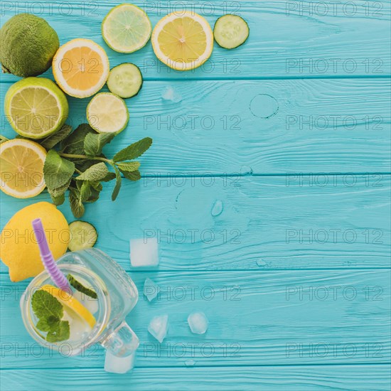 Blue wooden surface with lemons limes