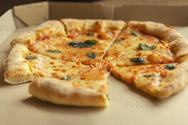 High angle delicious pizza box