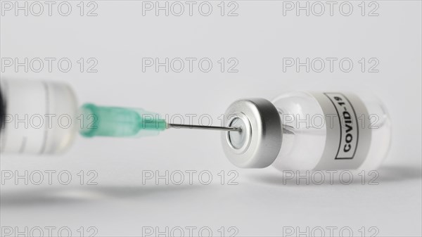Front view syringe vaccine bottle