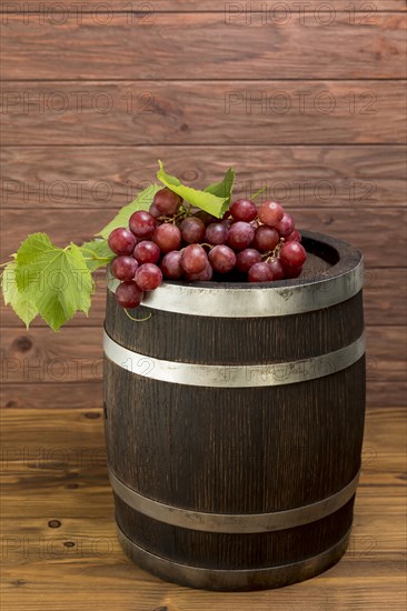 Bunch grapes wooden barrel