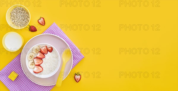 Bowl with cereals fruits with copy space