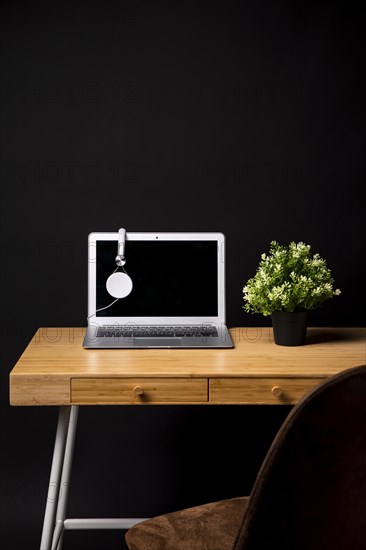 Wood desk with chair laptop