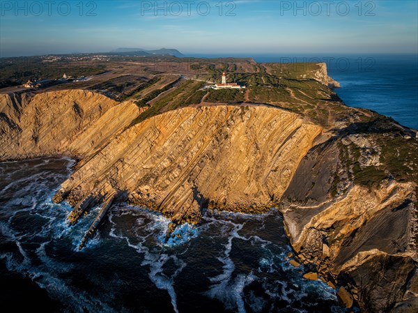 Aerial drone view of lighthouse on Cabo Espichel cape Espichel on Atlantic ocean