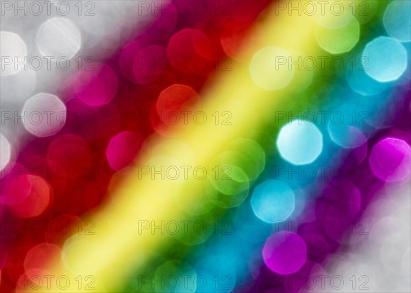 Defocused bedazzling rainbow glitter