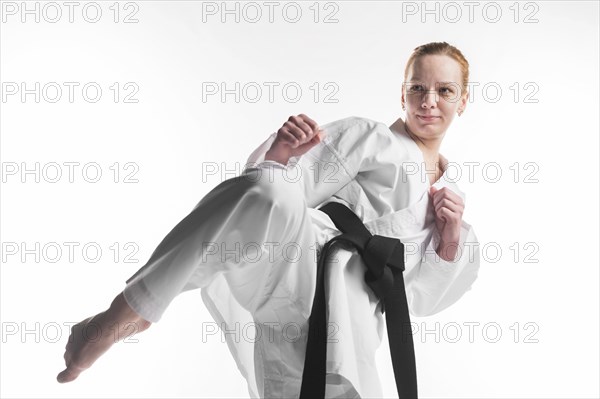Female fighter practicing close up