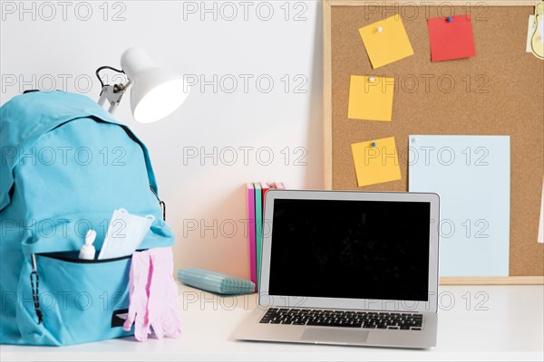 Back school arrangement new normal times with laptop