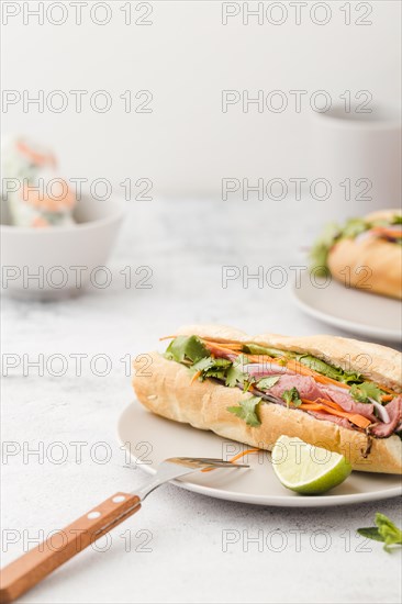 Sandwich with ham fork