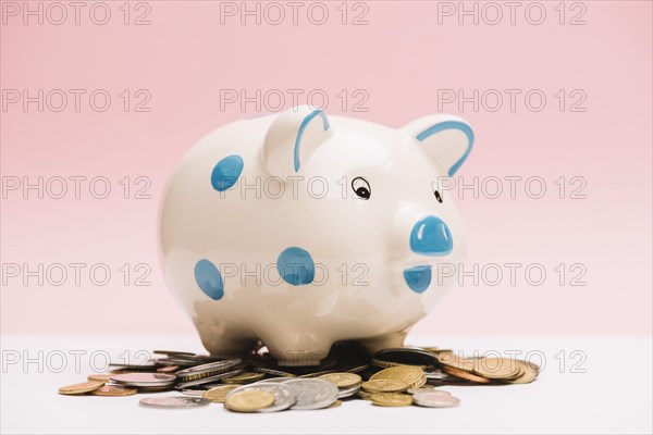 Spotted ceramic piggybank coins