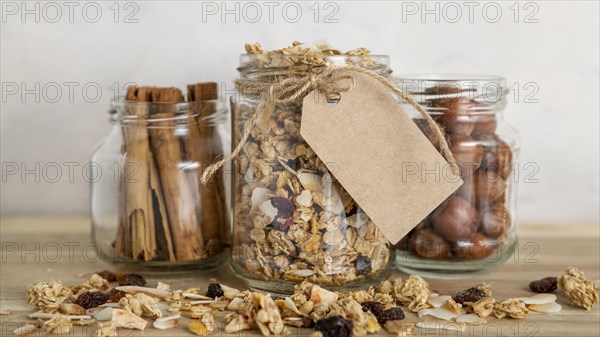Front view clear jars with breakfast cereals tag
