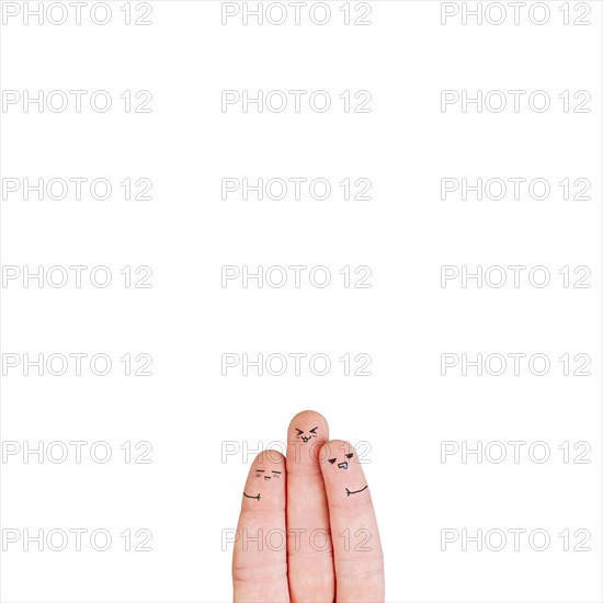 Three fingers with faces white
