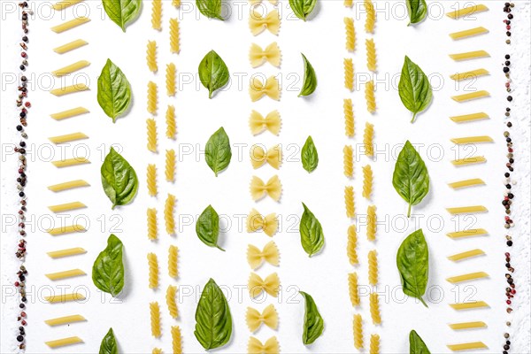 Top view pasta arrangement white background