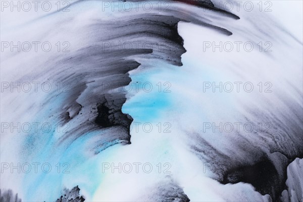 Blue black color hand drawn paint strokes white paper