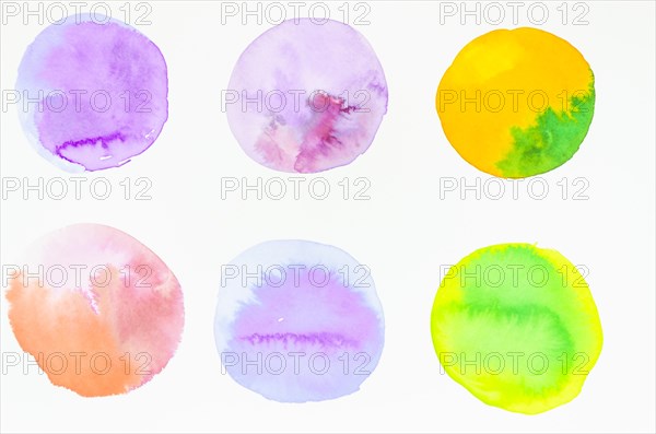 Row hand painted watercolor circles design isolated white