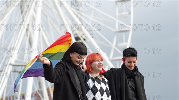 Group non binary people with lgbt flag