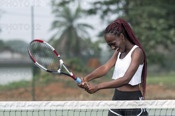 Portrait woman playing tennis