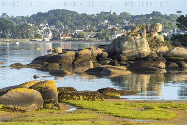 The rocks of the pink granite coast Cote de Granit Rose at the Baie de Sainte Anne near the peninsula Ile Renote