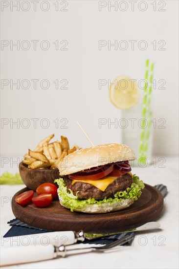 Burger with fries wood plate