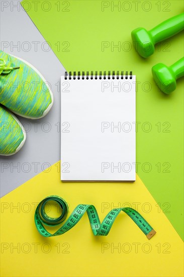 Top view sports equipment notebook mock up
