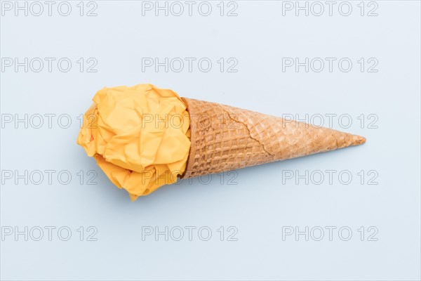 Fake yellow ice cream sugar cone