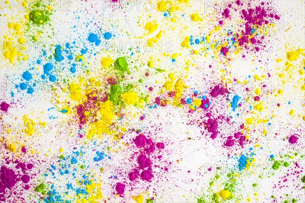 Multicolored powder splatter white background