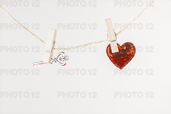 Small heart with key hanging rope